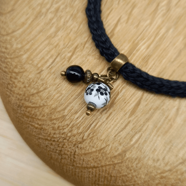 Parure noire et bronze - Bracelet tricoté noir